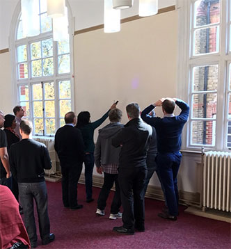 Go Indoors - teams looking for clue with ultra violet torch