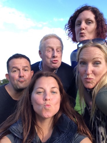 A team taking a selfie as part of a treasure hunt in Greenwich