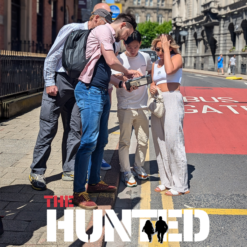 Teams participating in a city-wide 'Hunted' treasure hunt in London using iPads